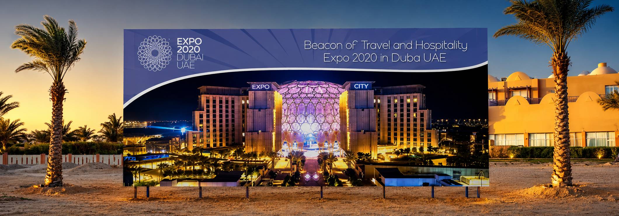 A large vertical banner or backdrop displaying the Expo 2020 Dubai Travel and Hospitality event branding and a nighttime resort scene, set outdoors between two palm trees at dusk.