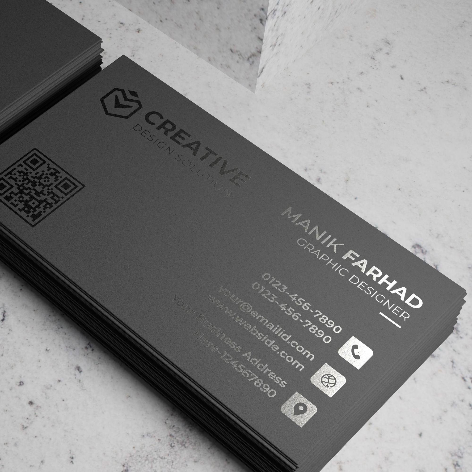 Spot UV coated business cards showing high gloss contrast on matte background printed by Formset Advertising